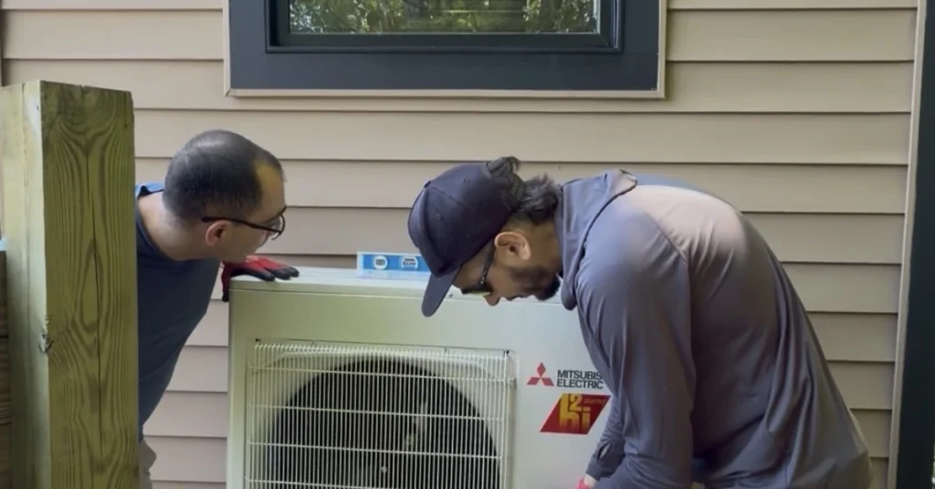 HVAC technicians completing a Mitsubishi heat pump installation, Chatham, NY